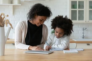 Homeschooling mom and daughter